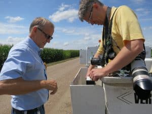 Getting set up in a boom truck to take photos of different corn plots (right before drones were so good).
